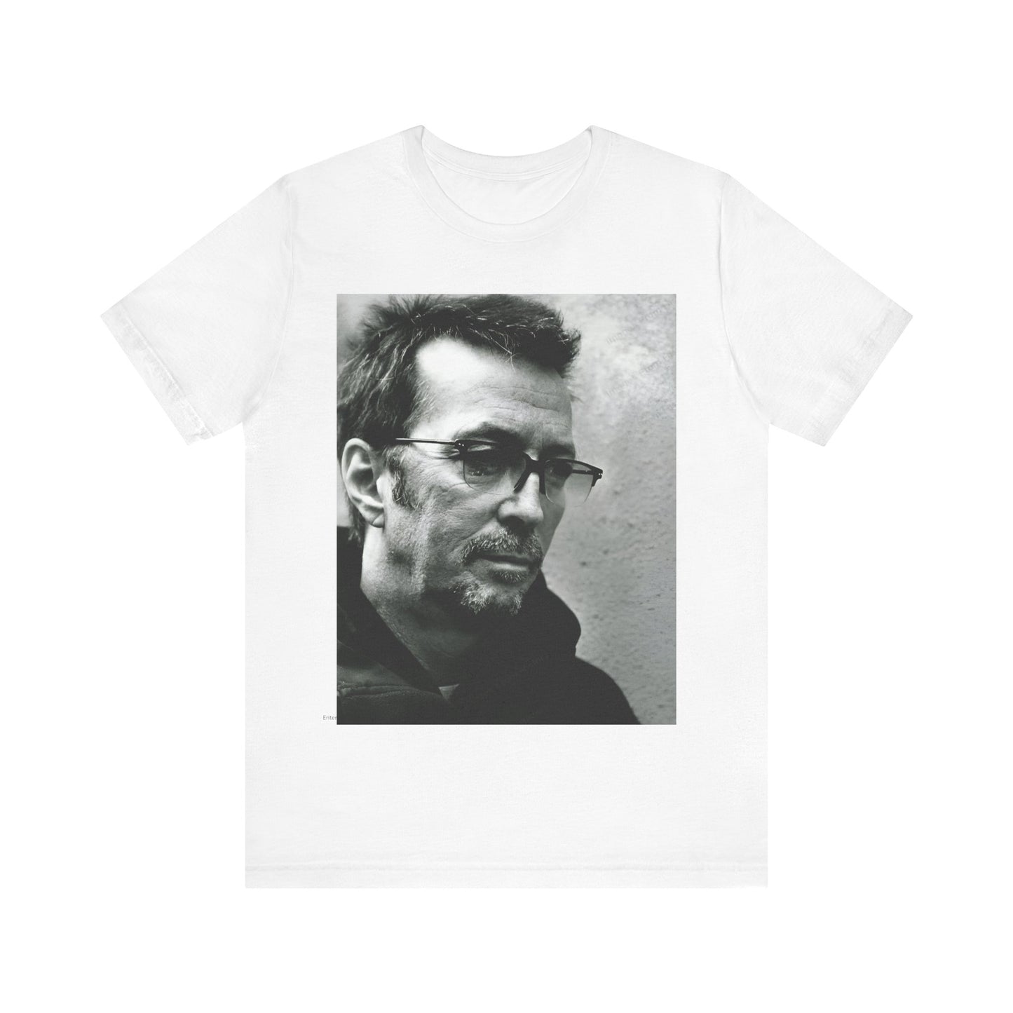 A black graphic t-shirt featuring a black and white, monochrome graphic or photo of Eric Clapton.