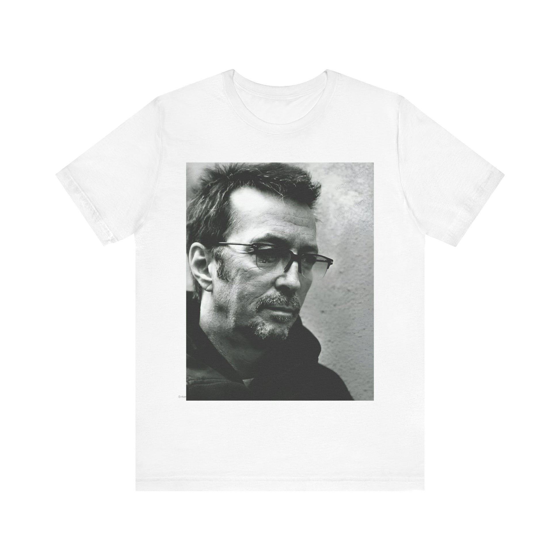 A black graphic t-shirt featuring a black and white, monochrome graphic or photo of Eric Clapton.