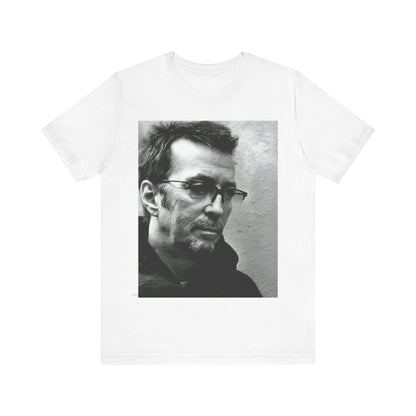 A black graphic t-shirt featuring a black and white, monochrome graphic or photo of Eric Clapton.