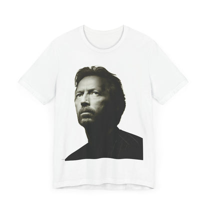 A black graphic t-shirt featuring a retro black and white portrait photo of Eric Clapton.