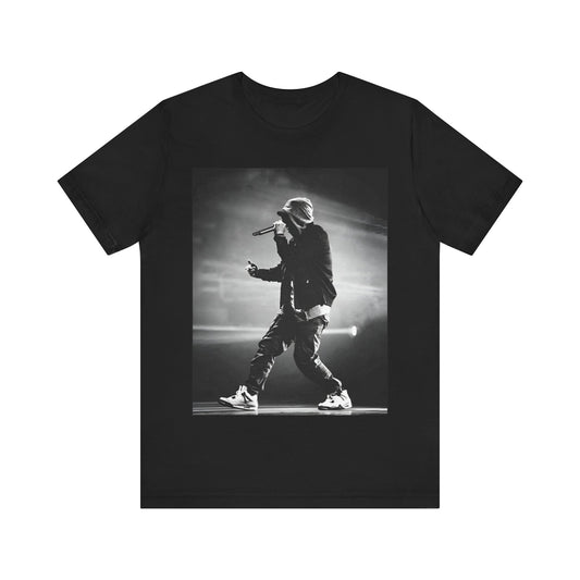 A black graphic t-shirt featuring a boxy hip hop aesthetic graphic of Eminem.