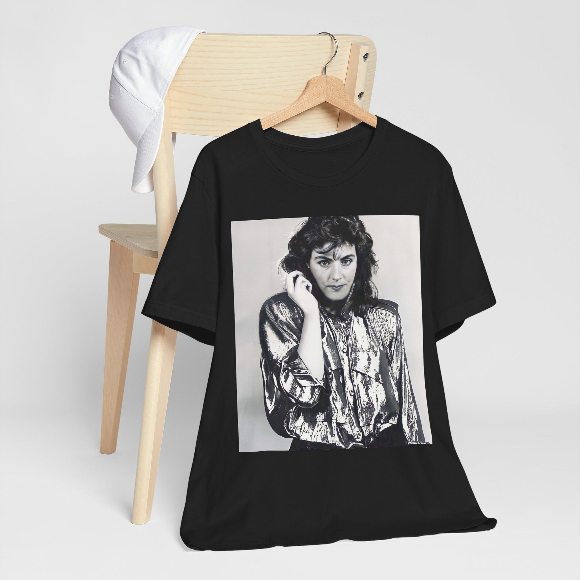 A black graphic t-shirt featuring a retro graphic related to Laura Branigan's 'Gloria' song or era.