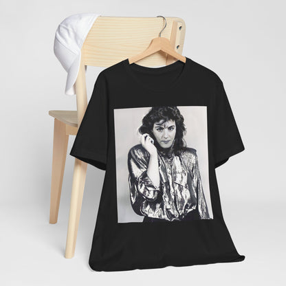 A black graphic t-shirt featuring a retro graphic related to Laura Branigan's 'Gloria' song or era.