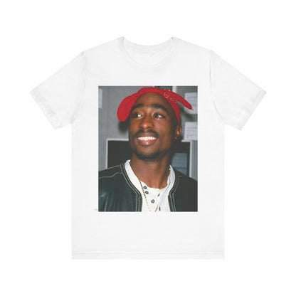 A black graphic t-shirt featuring a graphic of Tupac with his iconic bandana style.