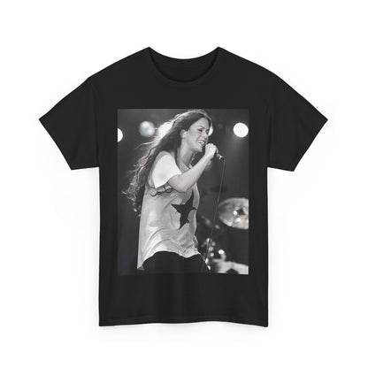 A black graphic t-shirt featuring a photo of Alanis Morissette performing live on stage in the 1990s, with a dynamic expression.