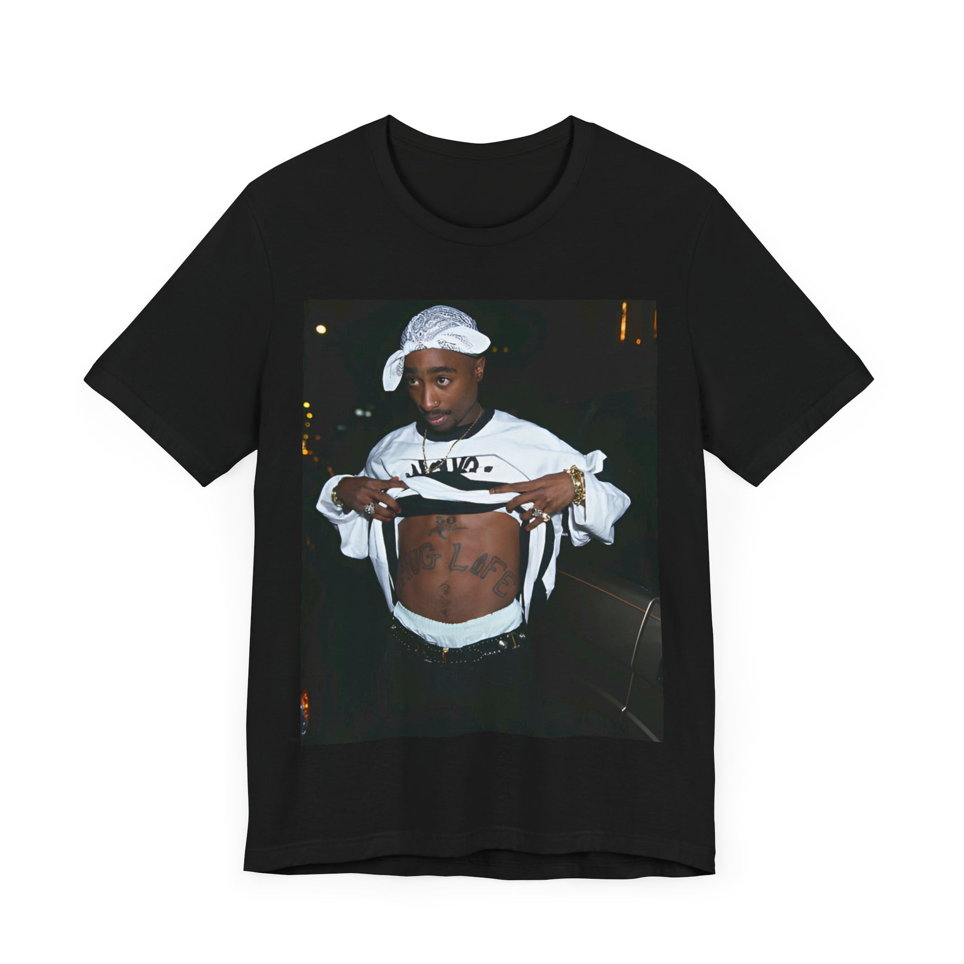 A black graphic t-shirt featuring a graphic of Tupac Shakur (2Pac).