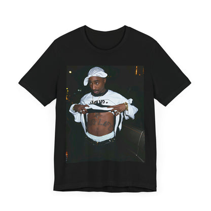 A black graphic t-shirt featuring a graphic of Tupac Shakur (2Pac).