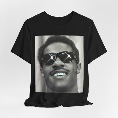 A black graphic t-shirt featuring a 70s funk aesthetic black and white graphic or photo of Stevie Wonder.