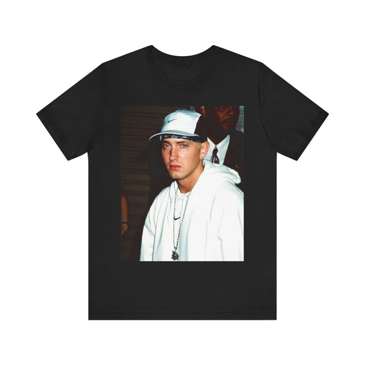 A black graphic t-shirt featuring a retro graphic or photo of Eminem in a backstage setting.