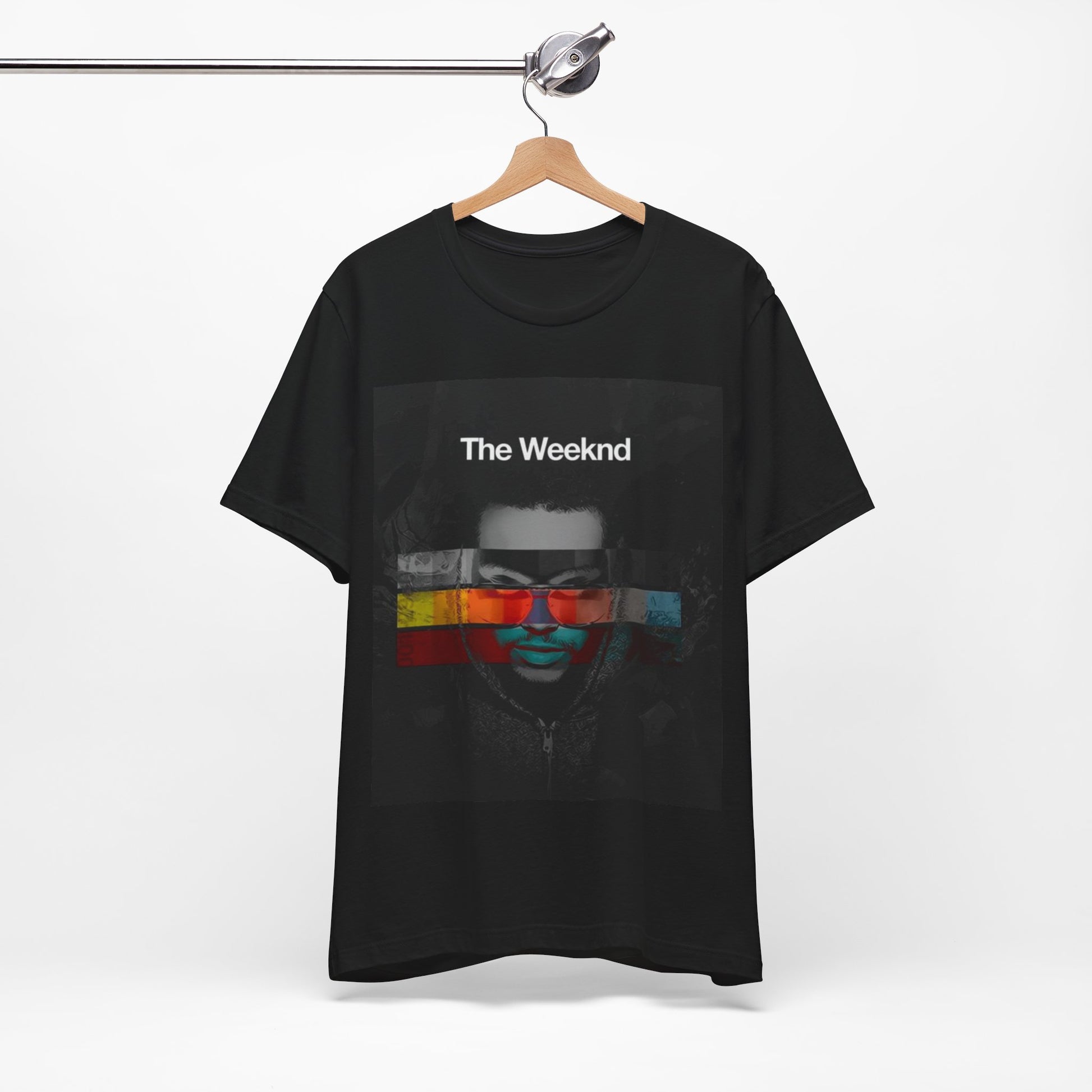 A black graphic t-shirt featuring a retro graphic related to The Weeknd's 'House of Balloons' mixtape.