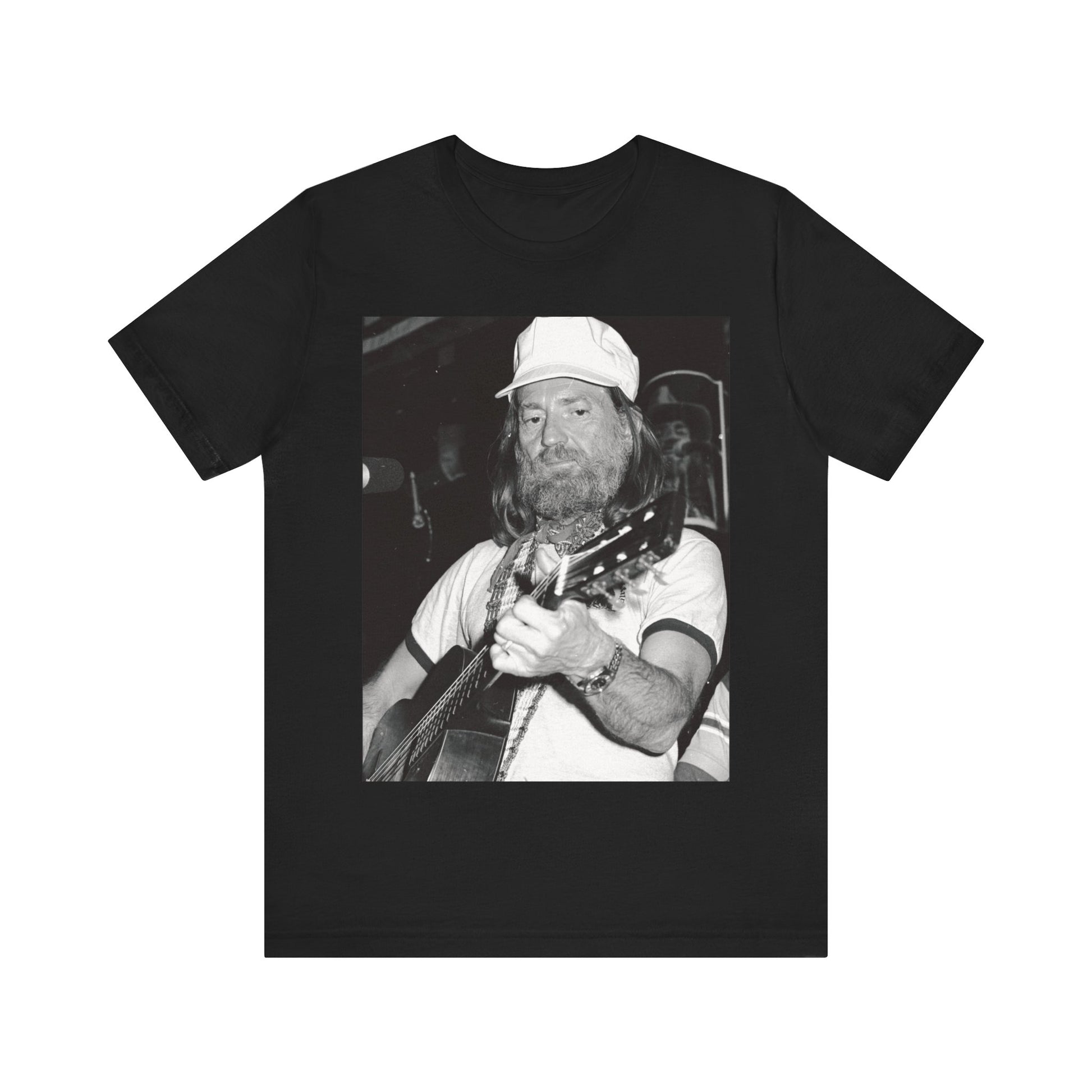 A black graphic t-shirt featuring a 70s cool free spirit graphic of Willie Nelson.