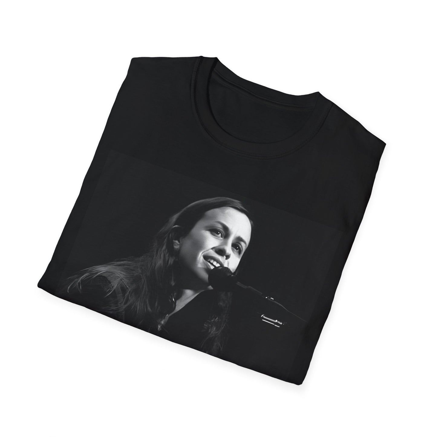 A black graphic t-shirt featuring a 90s-style graphic of Alanis Morissette on tour, possibly showing her performing or with tour elements.