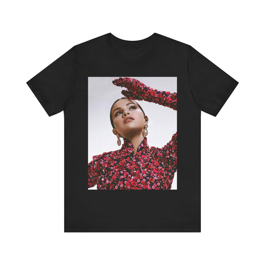 A black graphic t-shirt featuring a classic aesthetic graphic of Selena Gomez.