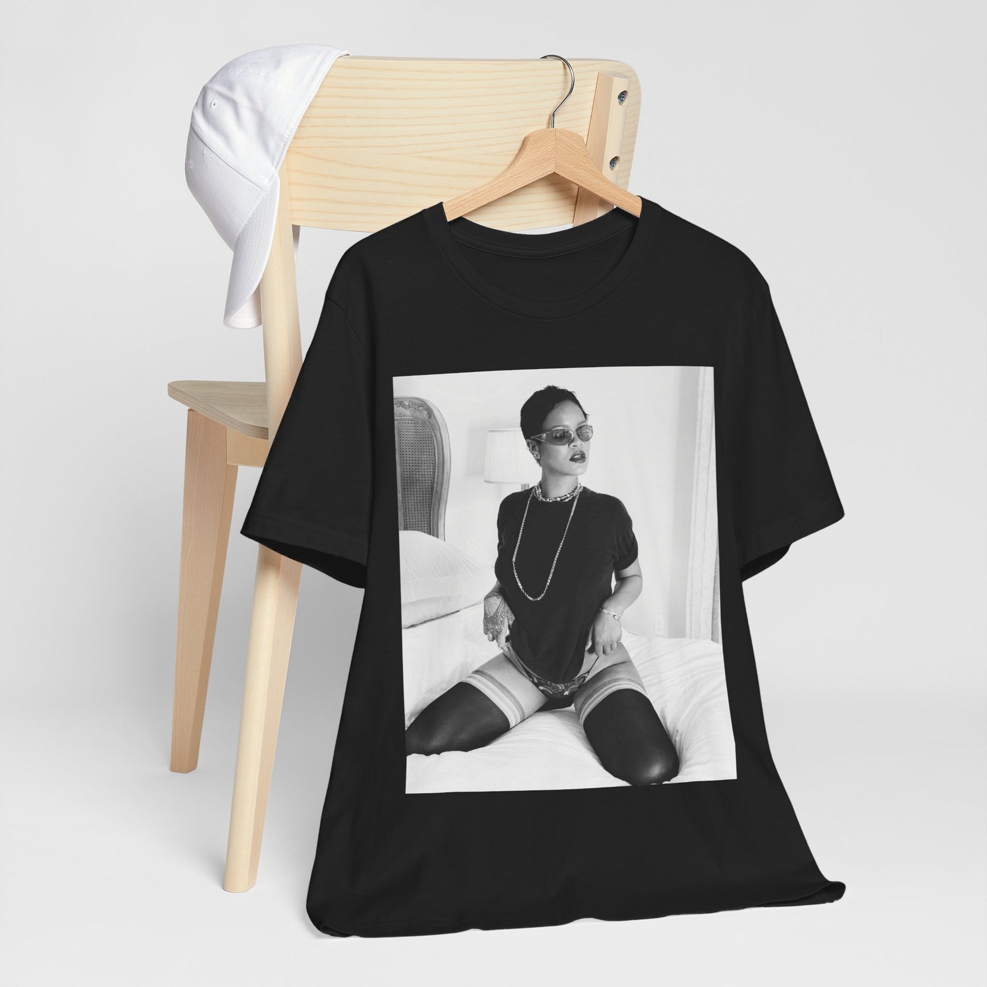A black graphic t-shirt featuring a black and white graphic related to Rihanna's 'Diamonds' song or era.