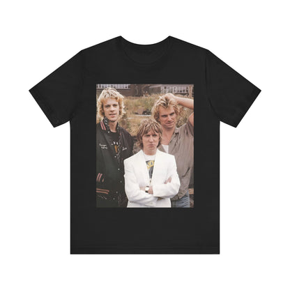 A black graphic t-shirt featuring a graphic of The Police as a timeless three-piece band.