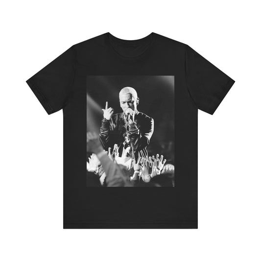 A black graphic t-shirt featuring a graphic or photo of Eminem performing live on stage.