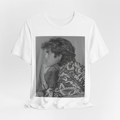 A black graphic t-shirt featuring a graphic of George Michael from his 80s Wham! era.