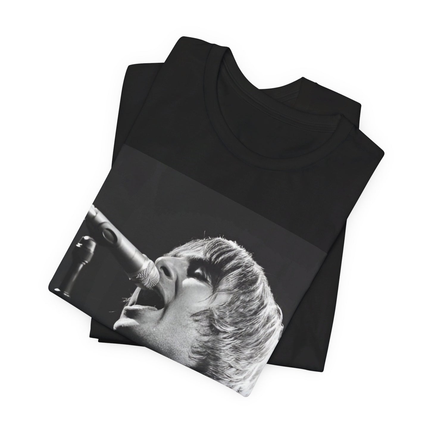 A black graphic t-shirt featuring a black and white graphic or photo of Liam Gallagher from Oasis performing live on stage.