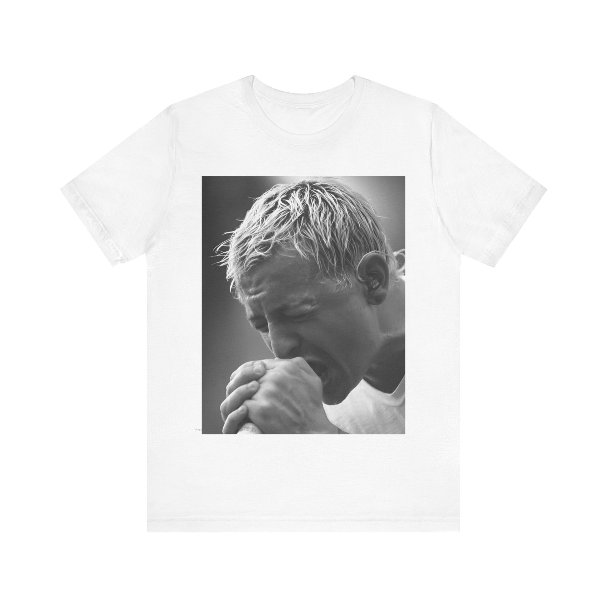 A black graphic t-shirt featuring a graphic or photo of Chester Bennington from Linkin Park performing live on stage.