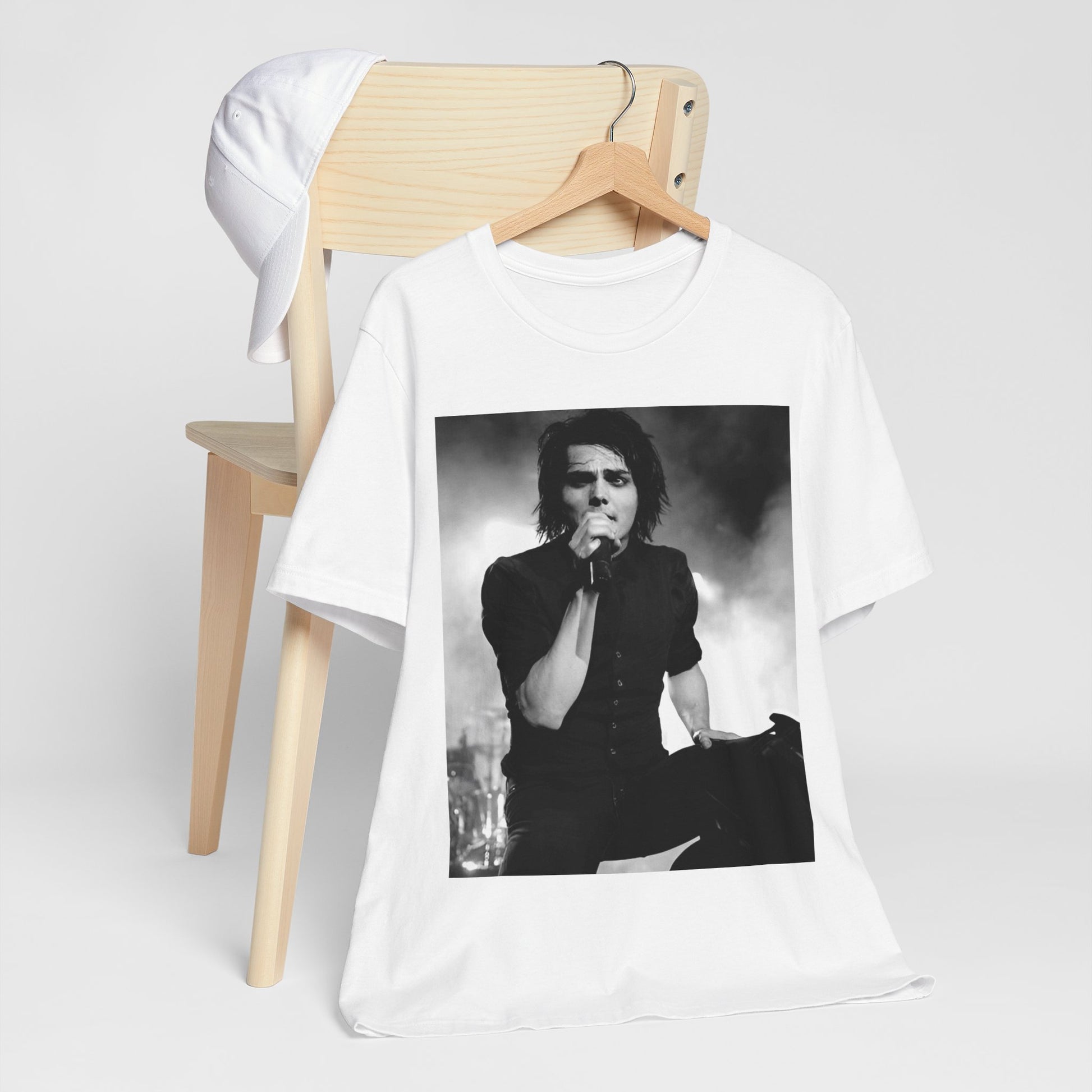 A black graphic t-shirt featuring a black and white graphic or photo of My Chemical Romance performing live in concert.