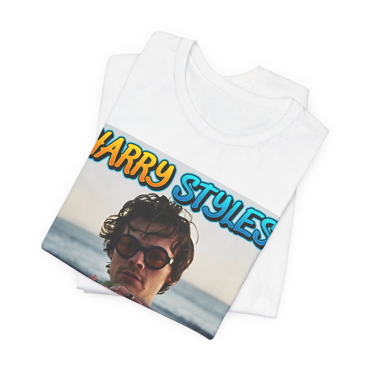 A black graphic t-shirt featuring a graphic related to Harry Styles' 'Watermelon Sugar' song or its viral impact.