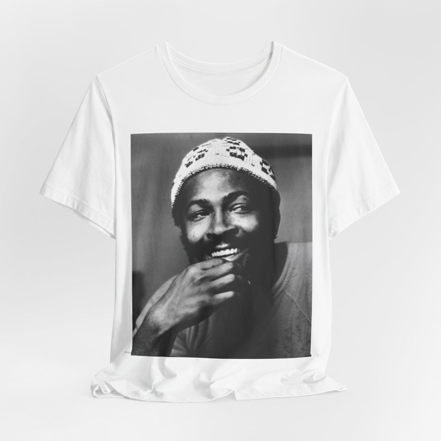 A black graphic t-shirt featuring a 70s retro portrait graphic of Marvin Gaye.