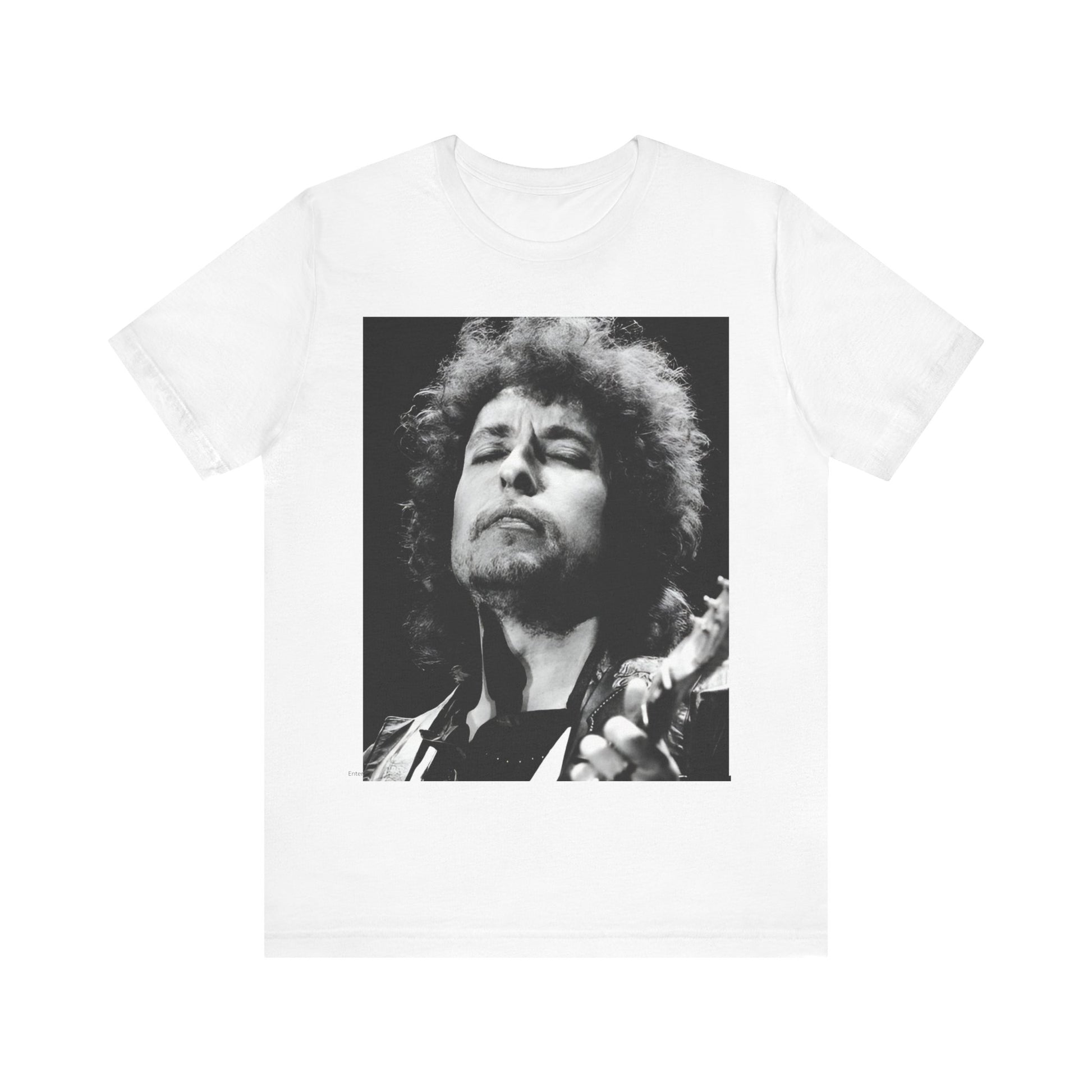 A black graphic t-shirt featuring a retro black and white graphic or photo of Bob Dylan performing live.
