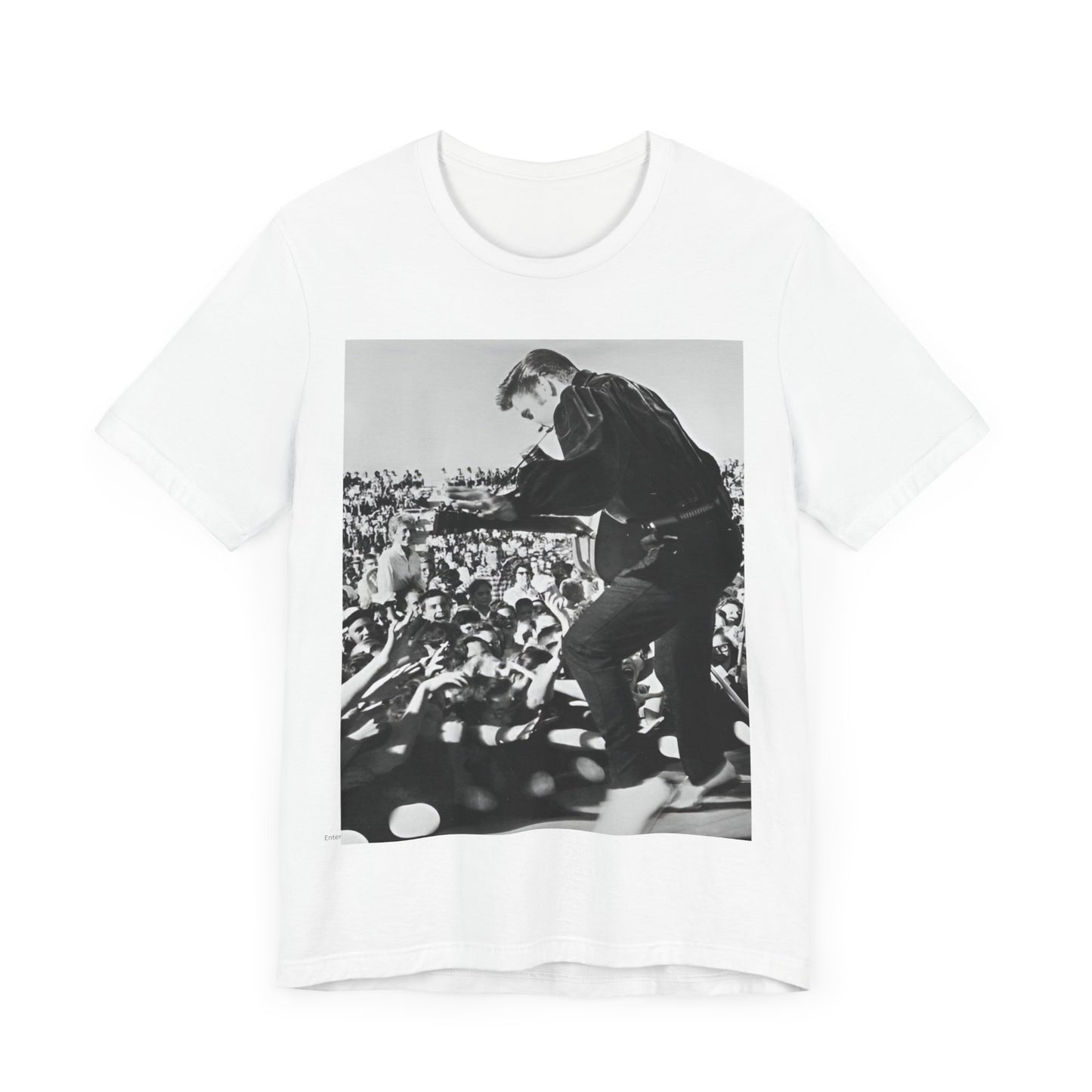 A black graphic t-shirt featuring a retro photo of Elvis Presley performing live in concert in the 1950s.