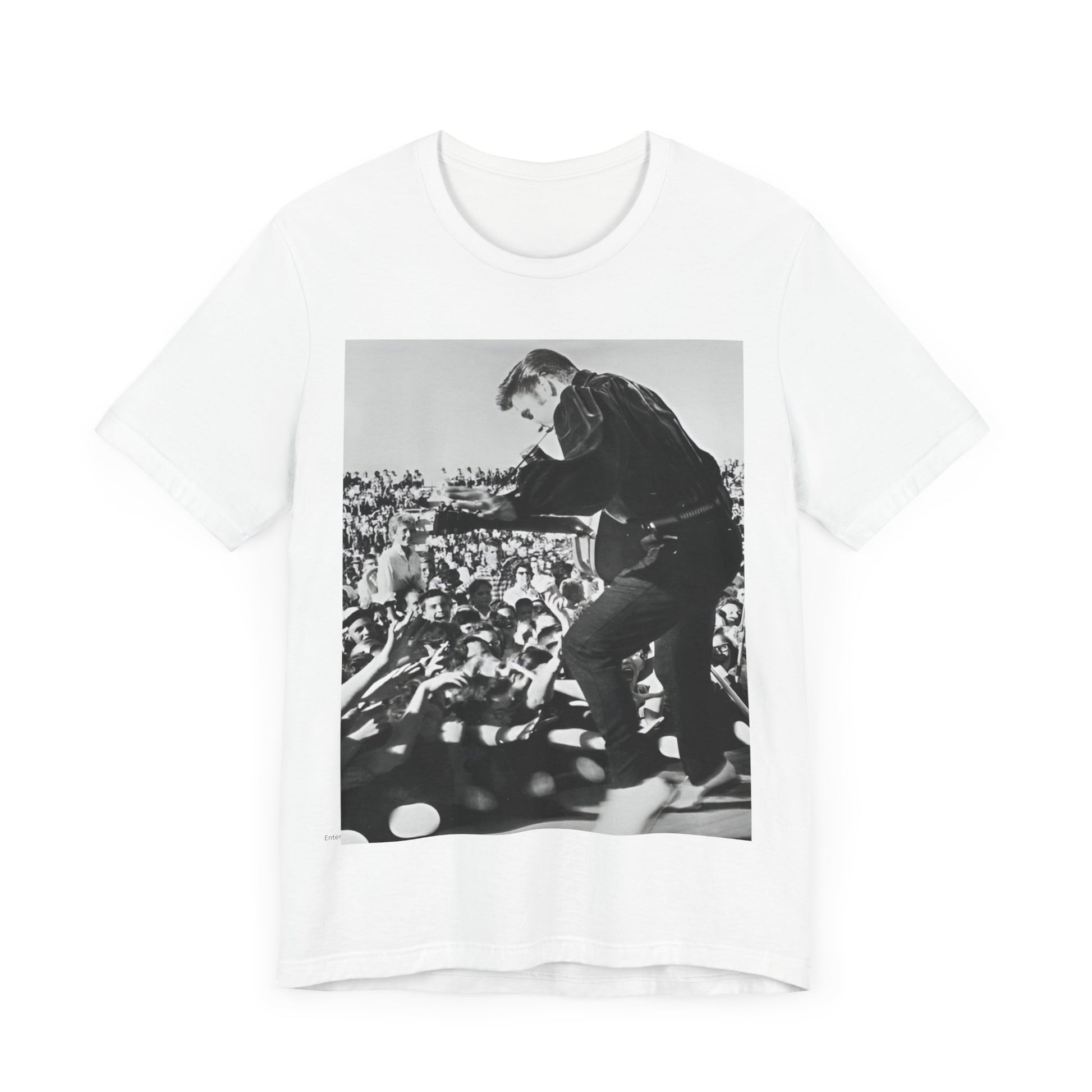 A black graphic t-shirt featuring a retro photo of Elvis Presley performing live in concert in the 1950s.