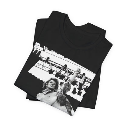 A black graphic t-shirt featuring an epic arena rock graphic of Bon Jovi performing on a large stage.