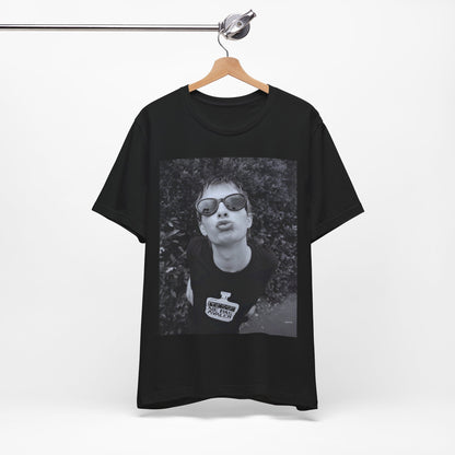 A black graphic t-shirt featuring a retro 90s graphic of Thom Yorke from Radiohead.