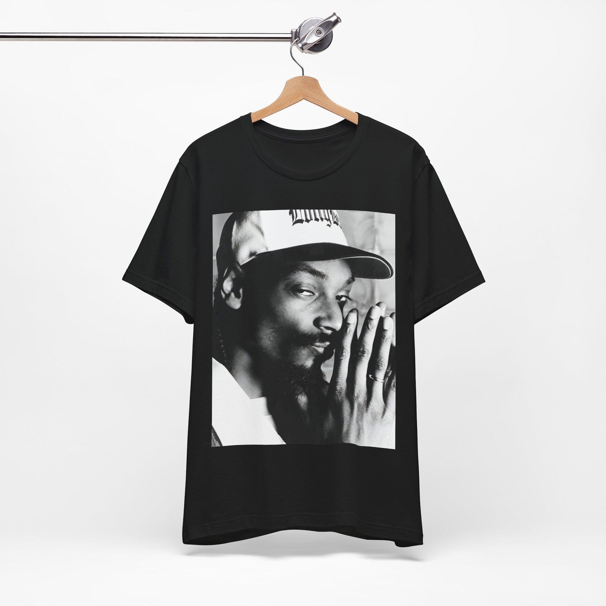 A black graphic t-shirt featuring a cool black and white graphic or photo of Snoop Dogg as a rapper.