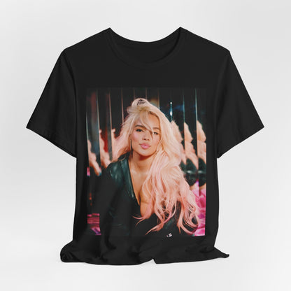 A black graphic t-shirt featuring a graphic of Karol G as an empowered Latina icon.