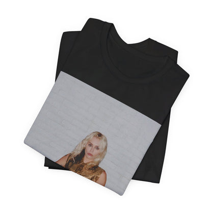 A black graphic t-shirt featuring an iconic fashion graphic of Miley Cyrus.