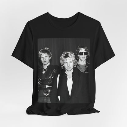 A black graphic t-shirt featuring a black and white, monochrome graphic or photo of The Police.