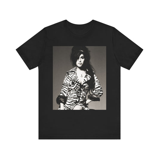 A black graphic t-shirt featuring a graphic related to Amy Winehouse's 'Back to Black' album era from 2006, possibly with album art elements.