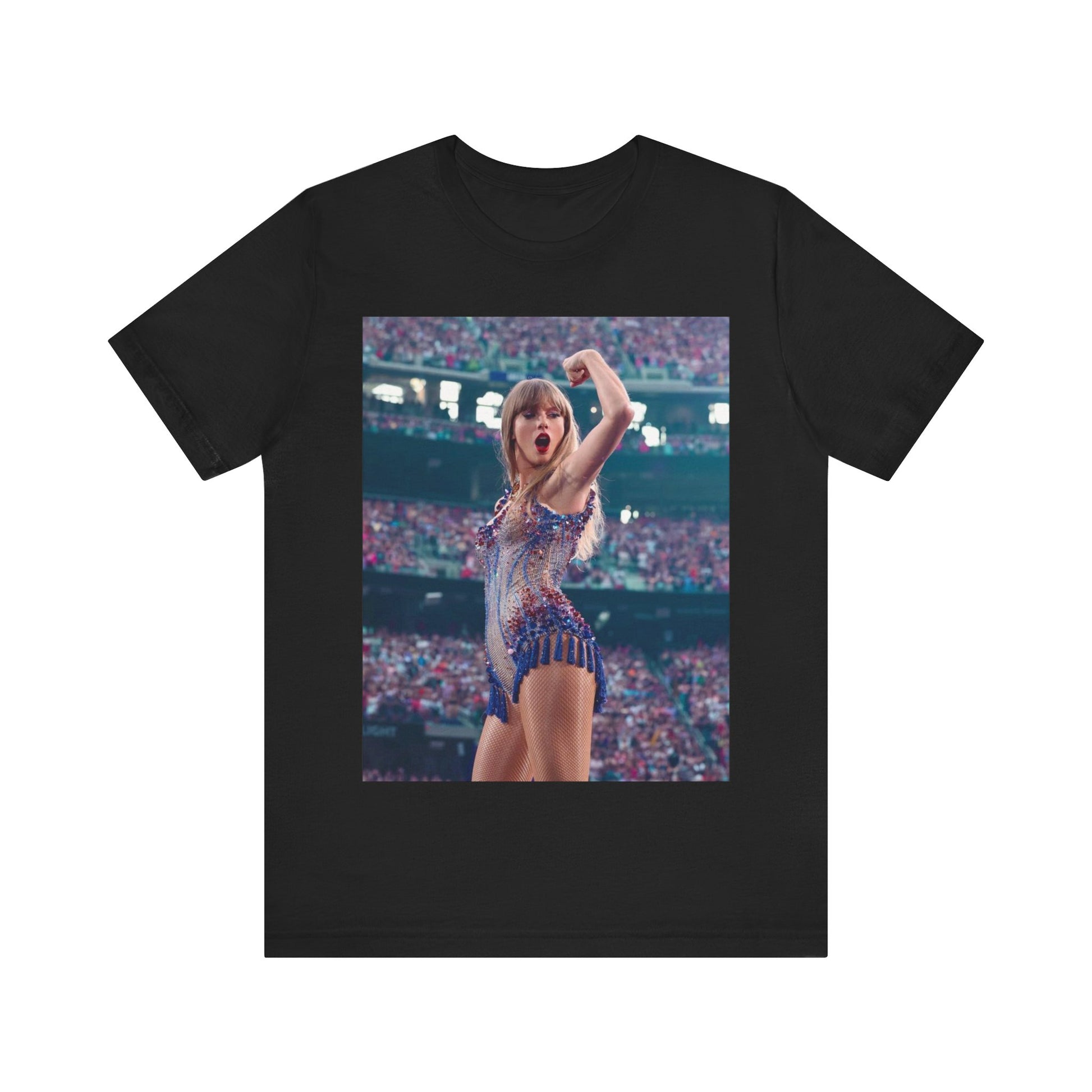 A black graphic t-shirt featuring a graphic or photo of Taylor Swift performing live on stage.