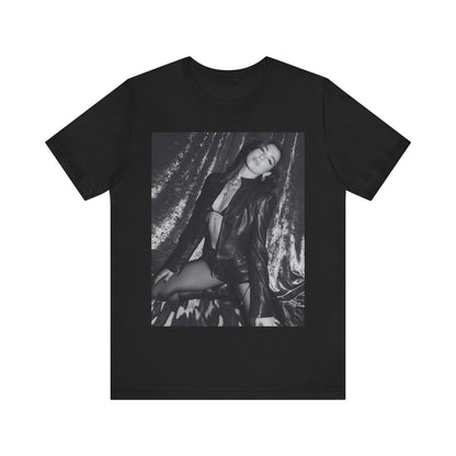 A black graphic t-shirt featuring a black and white portrait photo of Dua Lipa.