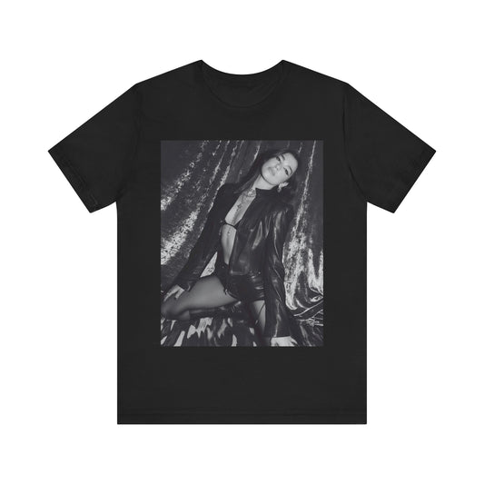 A black graphic t-shirt featuring a black and white portrait photo of Dua Lipa.