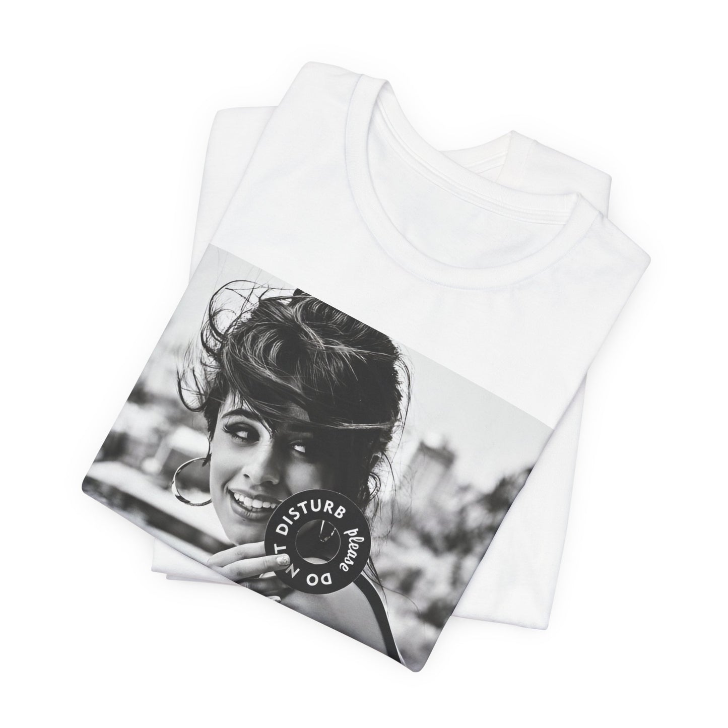 A black graphic t-shirt featuring a black and white photo or graphic of Camila Cabello in an iconic style.