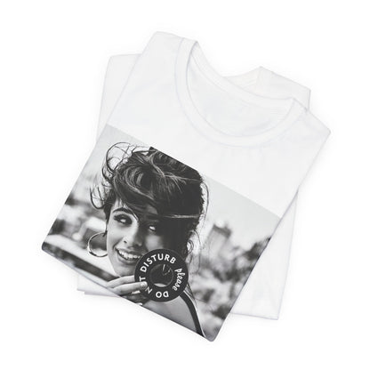 A black graphic t-shirt featuring a black and white photo or graphic of Camila Cabello in an iconic style.