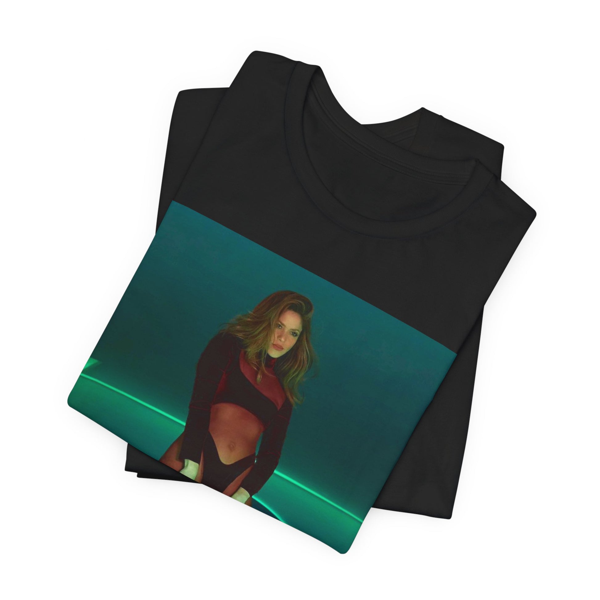 A black graphic t-shirt featuring a graphic of Shakira as the Queen of the Dance Floor.