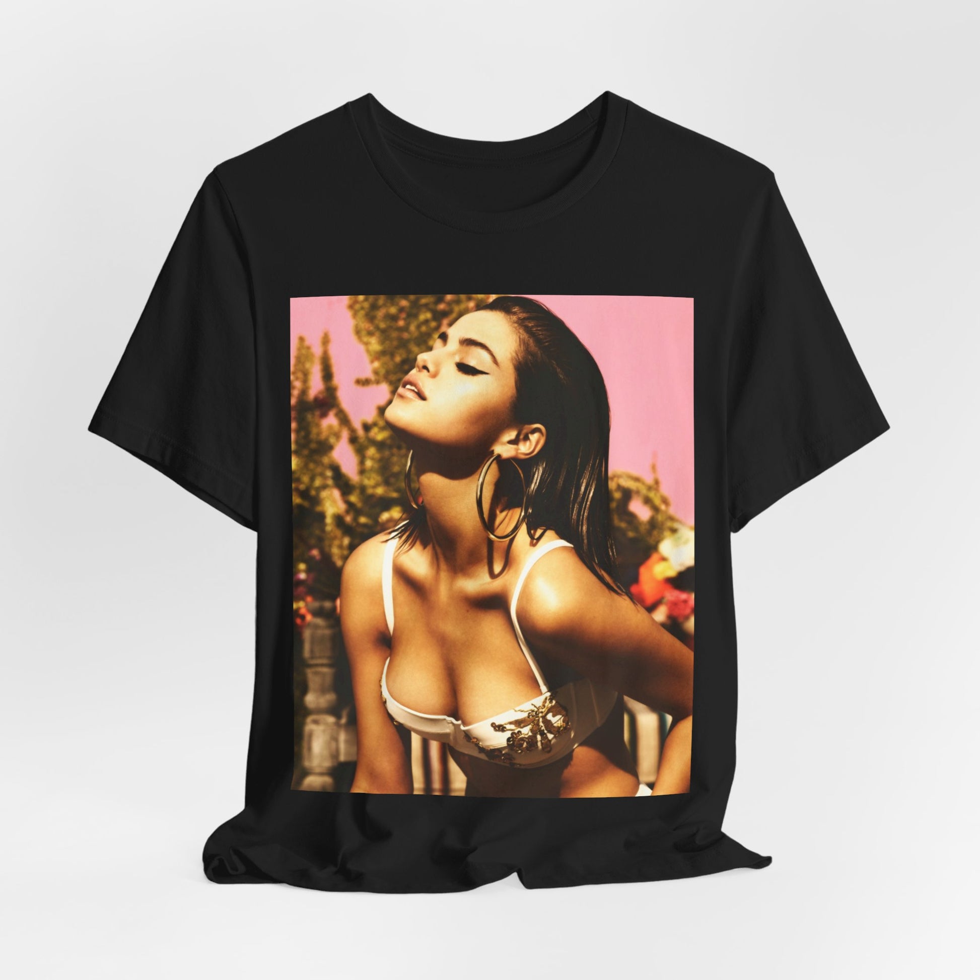 A black graphic t-shirt featuring a graphic of Selena Gomez emphasizing her timeless beauty.