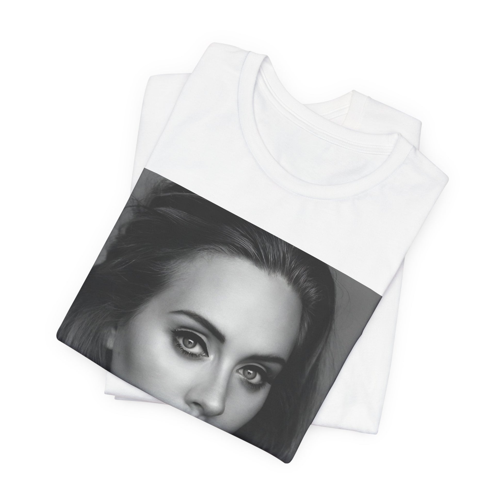 A black graphic t-shirt featuring a classic black and white, monochrome portrait of Adele, showing her with a serene or thoughtful expression.