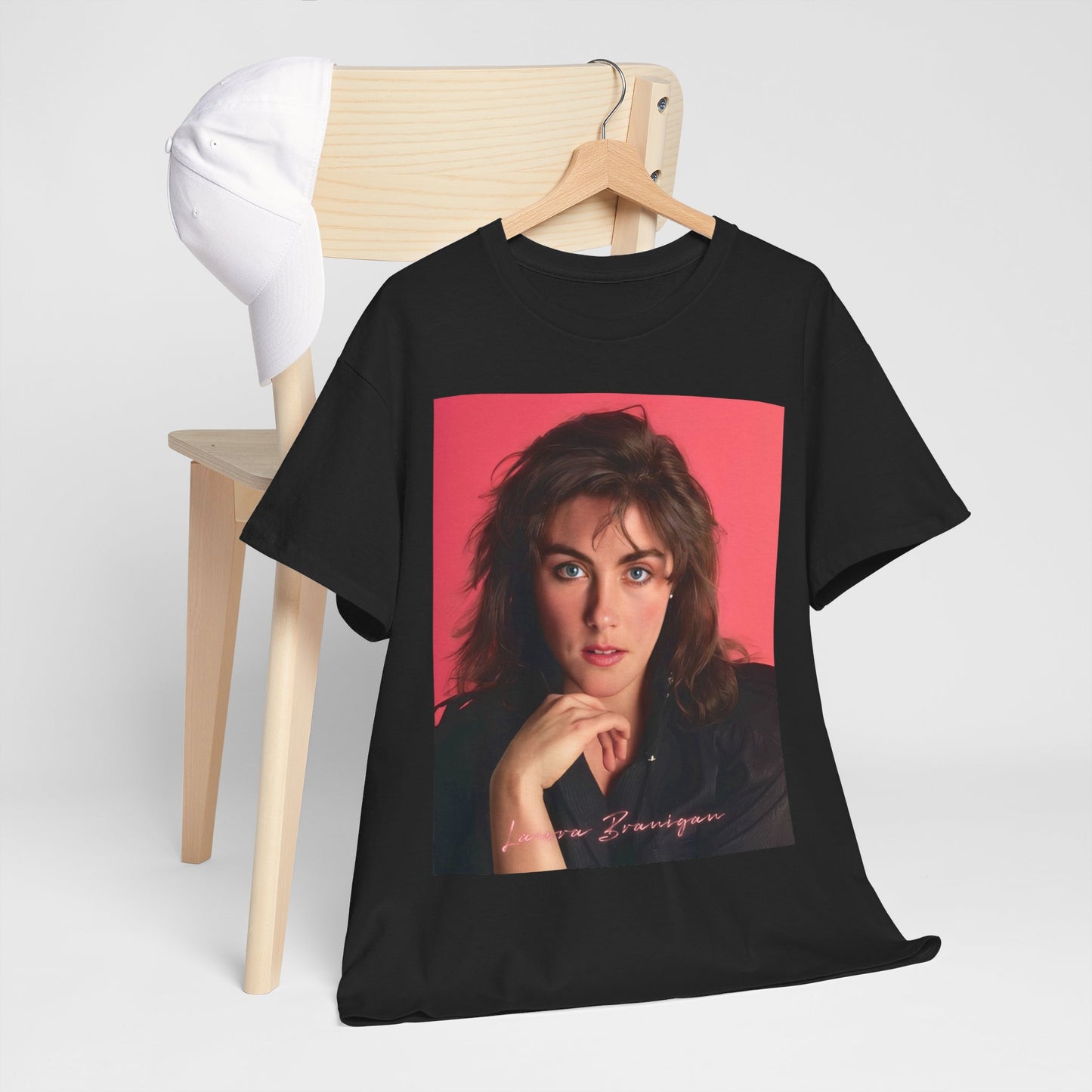 A black graphic t-shirt featuring a vintage 80s pop diva graphic of Laura Branigan.