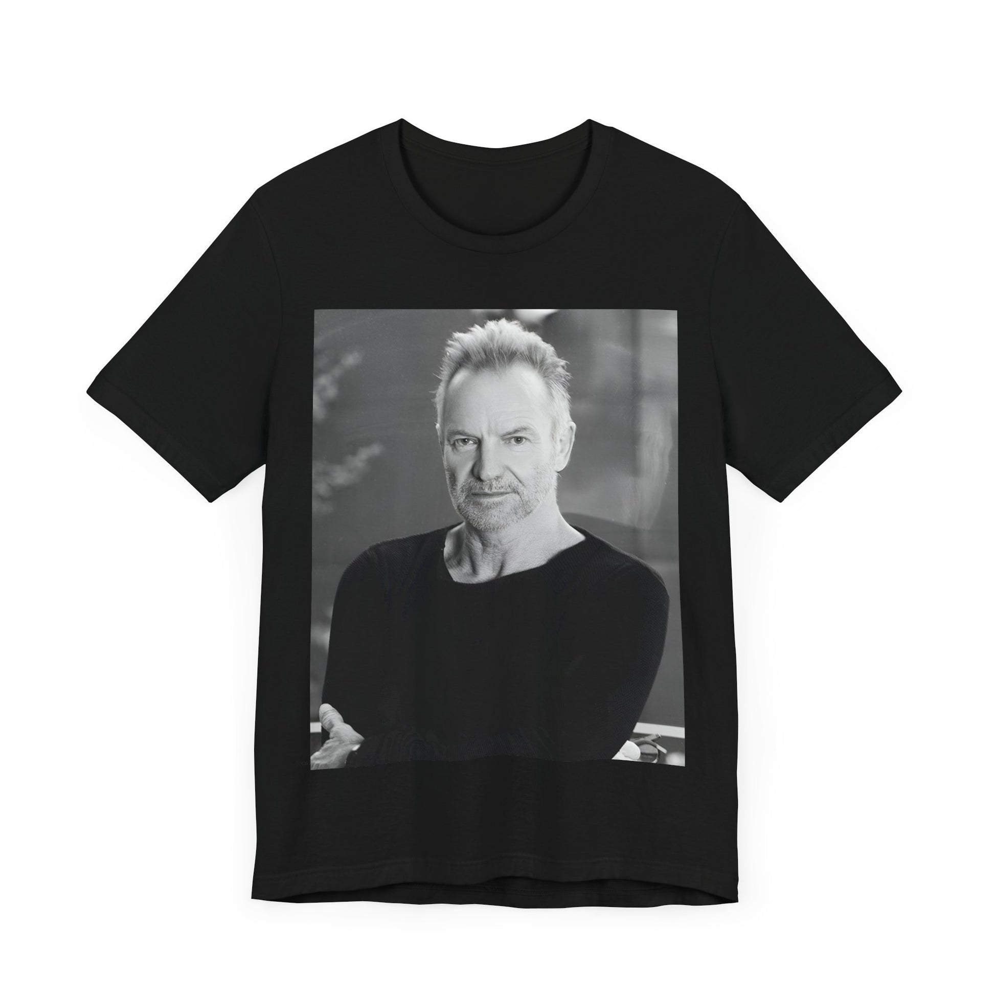 A black graphic t-shirt featuring a vintage graphic related to Sting's 'Desert Rose' song or era.