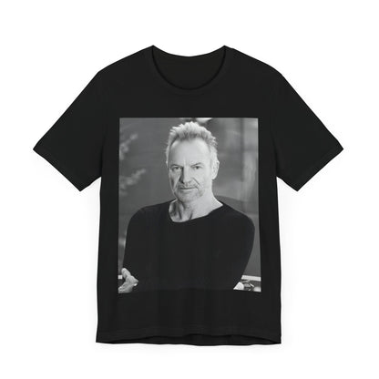 A black graphic t-shirt featuring a vintage graphic related to Sting's 'Desert Rose' song or era.