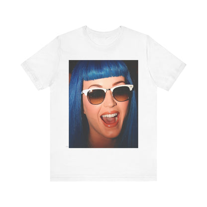 A black graphic t-shirt featuring a retro graphic of Katy Perry with blue hair.