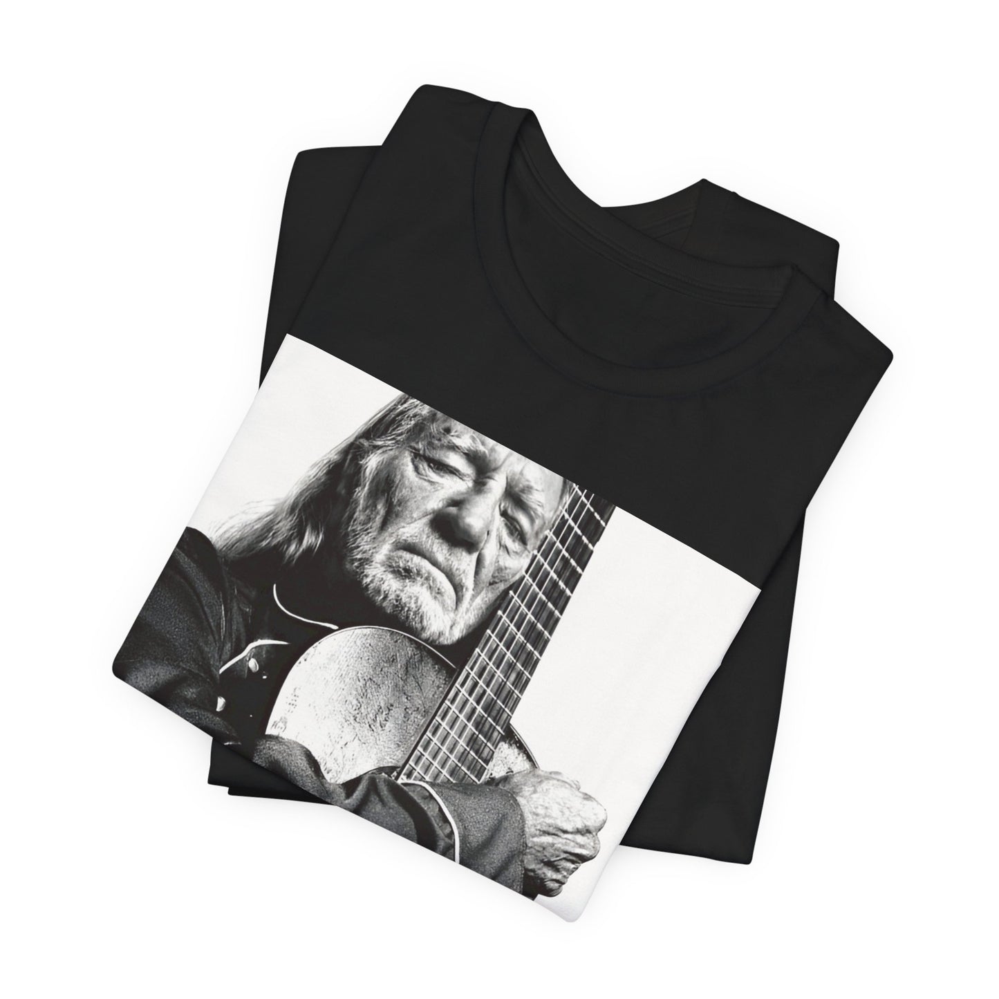 A black graphic t-shirt featuring a vintage country legend graphic of Willie Nelson.