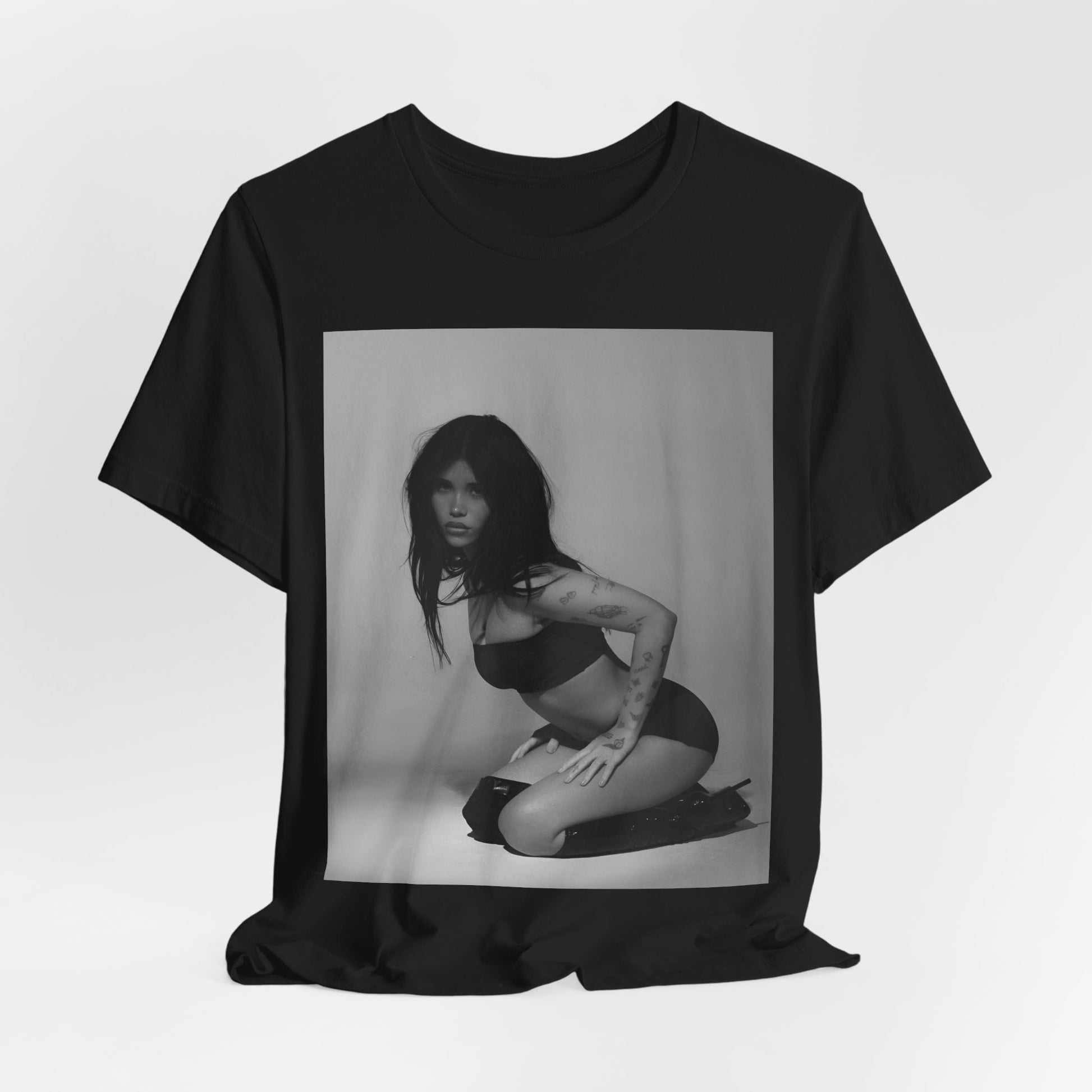 A black graphic t-shirt featuring a black and white, monochrome graphic or photo of Nessa Barrett.